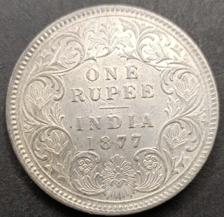 Silver One Rupee Coin of Victoria Empress of Calcutta Mint of 1877.